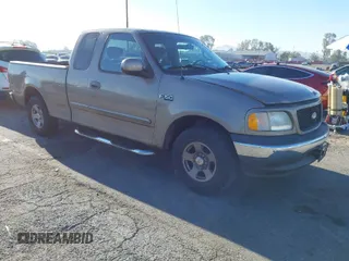 2002 Ford F-150 XL with VIN 1FTRX17232NA79508, listed as a IAAI auction lot 41870844 with 111,429 mi miles. Bid and sale history available at carsss.com. Image 1.