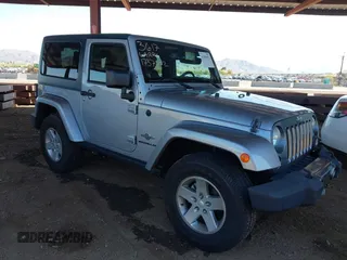 2014 Jeep Wrangler Sport with VIN 1C4AJWAG9EL194985, listed as a IAAI auction lot 41989452 with 66,435 mi miles and . Bid and sale history available at carsss.com. Image 1.