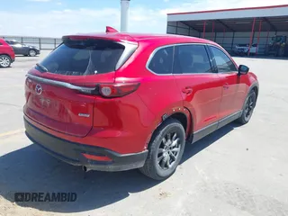 2016 Mazda CX-9 Touring with VIN JM3TCBCY5G0104504, listed as a IAAI auction lot 42314649 with 116,536 mi miles and . Bid and sale history available at DreamBid. Image 4.