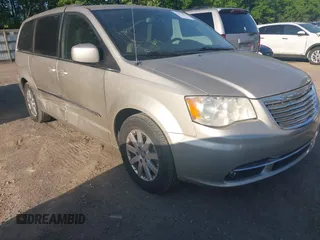 2014 Chrysler Town & Country Touring with VIN 2C4RC1BG7ER277126, listed as a IAAI auction lot 42072934 with 81,307 mi miles and . Bid and sale history available at DreamBid. Image 1.
