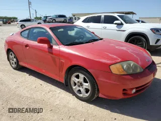 2003 Hyundai Tiburon GT z VIN KMHHN65F53U041351, wystawiony jako Copart lot #52332395 z przebiegiem 194 821 mil mil oraz Czysty tytuł • Clean title. Historia ofert i sprzedaży dostępna na DreamBid. Obrazek 4.