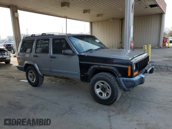 2000 Jeep Cherokee with VIN 1J4FF48S7YL221475, listed as a Copart auction lot 53005275 with 273,246 mi miles and Clean title. Bid and sale history available at DreamBid. Image 4.