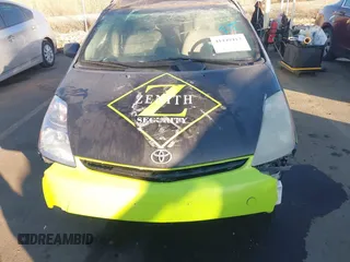 2006 Toyota Prius z VIN JTDKB22U763141508, wystawiony jako IAAI lot #41449413 z przebiegiem 243 914 mil mil oraz . Historia ofert i sprzedaży dostępna na DreamBid. Obrazek 11.
