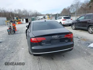 2015 Audi A8 L 4.0T with VIN WAU32AFD7FN006233, listed as a IAAI auction lot 41353034 with 119,693 mi miles. Bid and sale history available at carsss.com. Image 16.
