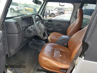 2002 Jeep Wrangler X с VIN 1J4FA39S52P770423, выставлен на аукционе Copart как лот 62498885 с пробегом 87 433 миль миль и Чистый • Clean title. История ставок и продаж доступна на DreamBid. Изображение 7.