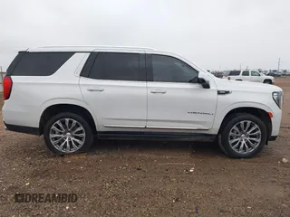 2021 GMC Yukon Denali with VIN 1GKS2DKL0MR178210, listed as a IAAI auction lot 41934532 with 91,785 mi miles. Bid and sale history available at carsss.com. Image 13.