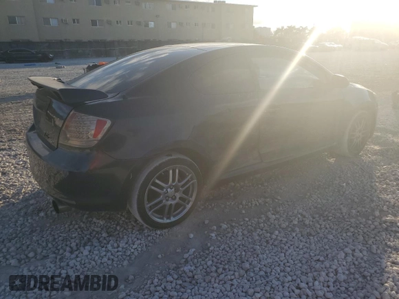 2007 Scion tC Spec with VIN JTKDE177370197342, listed as a Copart auction lot 82244514 with 143,075 mi miles and Salvage Title. Bid and sale history available at carsss.com. Image 3.