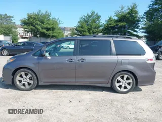 2012 Toyota Sienna SE with VIN 5TDXK3DCXCS267405, listed as a IAAI auction lot 42401101 with 134,553 mi miles and . Bid and sale history available at DreamBid. Image 14.