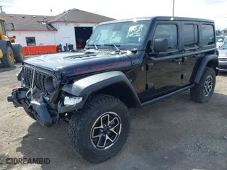 2024 Jeep Wrangler Rubicon with VIN 1C4PJXFG0RW268825, listed as a IAAI auction lot 41988213 with 19,526 mi miles. Bid and sale history available at carsss.com. Image 2.