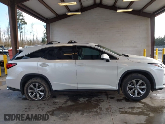 2018 Lexus RX 350L Premium z VIN JTJDZKCA5J2008427, wystawiony jako IAAI lot #41651433 z przebiegiem 51 216 mil mil oraz . Historia ofert i sprzedaży dostępna na DreamBid. Obrazek 13.