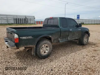 2000 Toyota Tacoma with VIN 4TAWN72N8YZ677345, listed as a Copart auction lot 61096865 with 217,590 mi miles and Clean title. Bid and sale history available at DreamBid. Image 3.