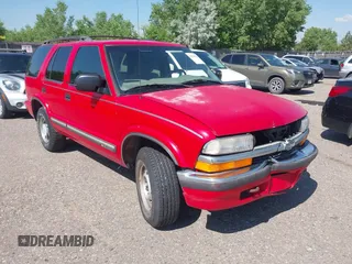 2000 Chevrolet Blazer LT with VIN 1GNDT13WXY2112052, listed as a IAAI auction lot 42525708 with 176,534 mi miles and . Bid and sale history available at DreamBid. Image 1.