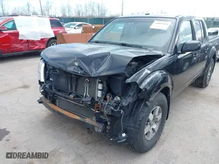 2009 Nissan Frontier SE with VIN 1N6AD07U09C404023, listed as a IAAI auction lot 41883164 with 100,724 mi miles. Bid and sale history available at carsss.com. Image 6.