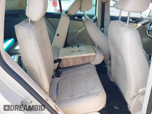 2012 Volkswagen Tiguan SE with VIN WVGAV7AX9CW581957, listed as a IAAI auction lot 42407148 with 135,553 mi miles and . Bid and sale history available at DreamBid. Image 8.
