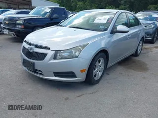 2014 Chevrolet Cruze 1LT with VIN 1G1PC5SB8E7410649, listed as a IAAI auction lot 42582375 with 228,772 mi miles and . Bid and sale history available at DreamBid. Image 2.