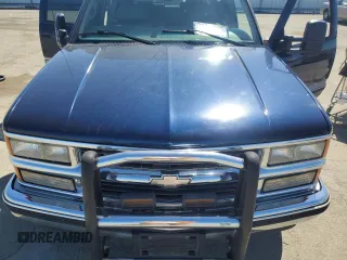 1999 Chevrolet Suburban with VIN 1GNEC16R1XJ394144, listed as a Copart auction lot 50418185 with 173,037 mi miles and Salvage title. Bid and sale history available at DreamBid. Image 13.