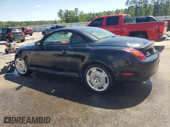 2003 Lexus SC 430 with VIN JTHFN48Y730047333, listed as a Copart auction lot 52112085 with 106,750 mi miles and Salvage title. Bid and sale history available at DreamBid. Image 2.