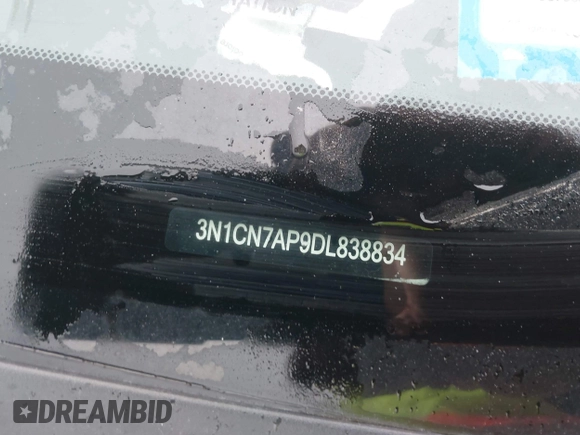 2013 Nissan Versa S Plus z VIN 3N1CN7AP9DL838834, wystawiony jako IAAI lot #41959162 z przebiegiem 94 906 mil mil oraz . Historia ofert i sprzedaży dostępna na DreamBid. Obrazek 12.