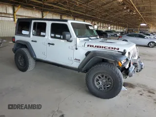 2021 Jeep Wrangler Unlimited Rubicon z VIN 1C4JJXFG5MW767036, wystawiony jako Copart lot #56918355 z przebiegiem 52 994 mil mil oraz Szkoda całkowita • Salvage title. Historia ofert i sprzedaży dostępna na DreamBid. Obrazek 4.