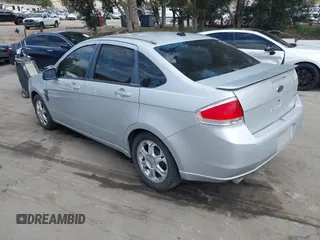 2008 Ford Focus SE with VIN 1FAHP35N18W199448, listed as a IAAI auction lot 42088860 with 174,391 mi miles. Bid and sale history available at carsss.com. Image 3.