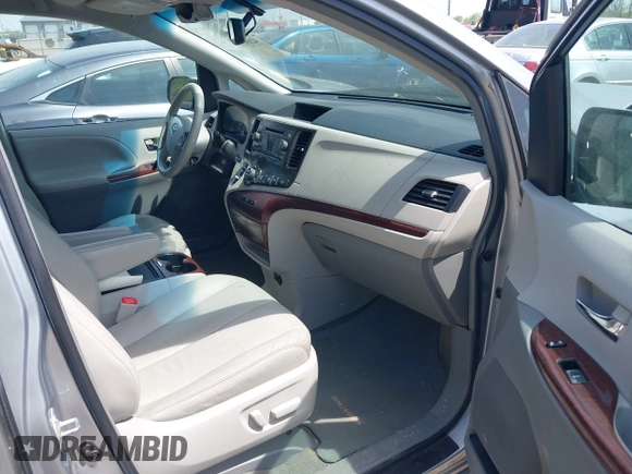 2014 Toyota Sienna XLE with VIN 5TDYK3DC9ES413283, listed as a IAAI auction lot 42091379 with 184,506 mi miles and . Bid and sale history available at DreamBid. Image 5.