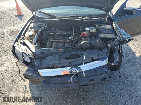 2012 Ford Fusion SE z VIN 3FAHP0HA9CR273430, wystawiony jako Copart lot #62766575 z przebiegiem 212 399 mil mil oraz Szkoda całkowita • Salvage title. Historia ofert i sprzedaży dostępna na DreamBid. Obrazek 13.