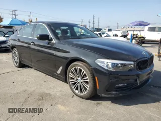 2018 BMW 5 Series 530i with VIN WBAJA5C52JWA36440, listed as a Copart auction lot 63325515 with 8,786 mi miles and Salvage title. Bid and sale history available at DreamBid. Image 4.