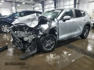 2019 Mazda CX-5 Touring with VIN JM3KFACM4K1552732, listed as a Copart auction lot 48226525 with 125,429 mi miles and Salvage Title. Bid and sale history available at carsss.com. Image 1.