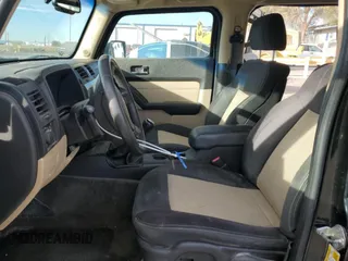 2009 Hummer H3 SUV with VIN 5GTEN13E298145360, listed as a Copart auction lot 77225884 with 134,133 mi miles and Salvage Title. Bid and sale history available at carsss.com. Image 7.