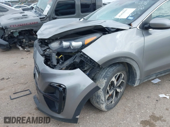 2020 Kia Sportage LX with VIN KNDPM3AC5L7720838, listed as a IAAI auction lot 41458808 with 52,689 mi miles and . Bid and sale history available at DreamBid. Image 16.