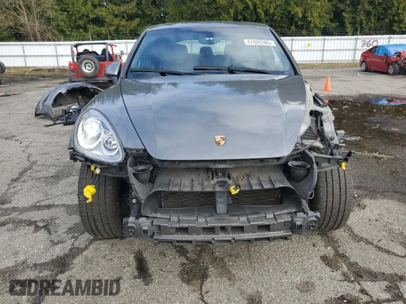 2014 Porsche Cayenne S with VIN WP1AB2A21ELA59007, listed as a Copart auction lot 47820385 with 69,924 mi miles and Salvage title. Bid and sale history available at DreamBid. Image 5.