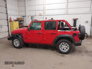 2023 Jeep Wrangler Sport S with VIN 1C4HJXDN1PW630003, listed as a IAAI auction lot 40989202 with 48,000 mi miles and . Bid and sale history available at DreamBid. Image 14.