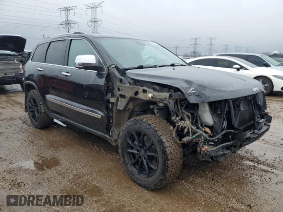 2013 Jeep Grand Cherokee Overland with VIN 1C4RJFCT9DC615096, listed as a Copart auction lot 86817074 with 112,421 mi miles and Salvage Title. Bid and sale history available at carsss.com. Image 4.