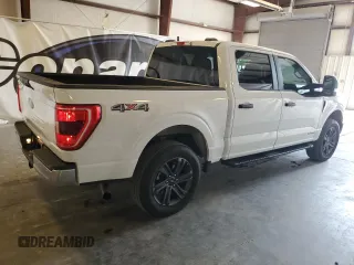2023 Ford F-150 XL with VIN 1FTFW1EDXPFA77220, listed as a Copart auction lot 62571285 with 90,277 mi miles and Clean title. Bid and sale history available at DreamBid. Image 3.