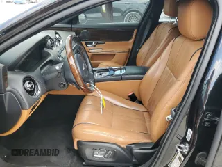 2012 Jaguar XJ with VIN SAJWA1CB5CLV27448, listed as a Copart auction lot 53373985 with 90,603 mi miles and Salvage Title. Bid and sale history available at DreamBid. Image 7.
