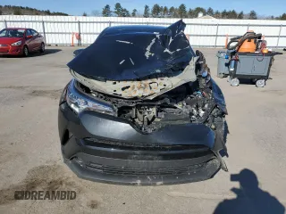 2019 Toyota C-HR XLE z VIN JTNKHMBX0K1040753, wystawiony jako Copart lot #52370615 z przebiegiem 120 056 mil mil oraz Szkoda całkowita • Salvage title. Historia ofert i sprzedaży dostępna na DreamBid. Obrazek 5.