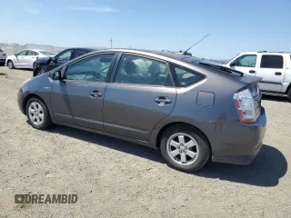 2007 Toyota Prius z VIN JTDKB20U473211597, wystawiony jako Copart lot #58437915 z przebiegiem 252 737 mil mil oraz Szkoda całkowita • Salvage title. Historia ofert i sprzedaży dostępna na DreamBid. Obrazek 2.