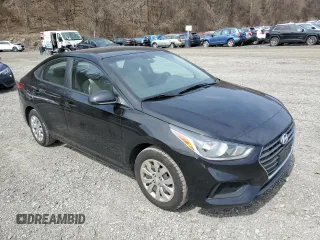 2018 Hyundai Accent SE with VIN 3KPC24A37JE033710, listed as a Copart auction lot 52130895 with 156,921 mi miles and Clean Title. Bid and sale history available at carsss.com. Image 4.
