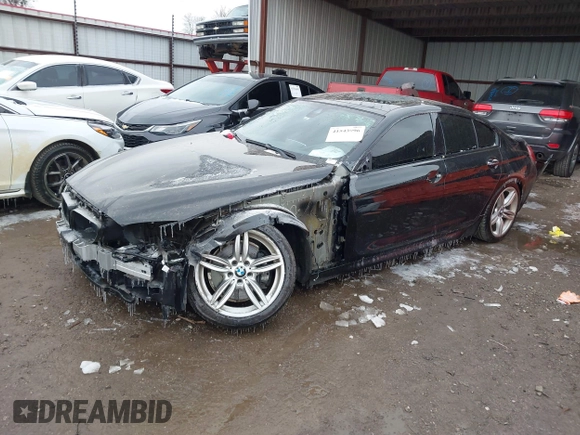 2015 BMW 6 Series 640i with VIN WBA6A0C55FGB53603, listed as a IAAI auction lot 41543996 with 71,046 mi miles and . Bid and sale history available at DreamBid. Image 18.