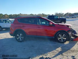 2017 Toyota RAV4 XLE with VIN 2T3RFREV7HW661708, listed as a IAAI auction lot 41367714 with 121,457 mi miles. Bid and sale history available at carsss.com. Image 13.
