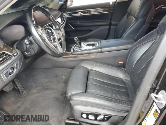 2020 BMW 7 Series 740i z VIN WBA7T2C06LGL17660, wystawiony jako Copart lot #57347885 z przebiegiem Nie podano mil oraz Tytuł czysty. Historia ofert i sprzedaży dostępna na DreamBid. Obrazek 7.