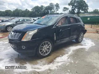 2014 Cadillac SRX Performance Collection z VIN 3GYFNCE31ES561091, wystawiony jako Copart lot #60537895 z przebiegiem Nie podano mil oraz Nie do naprawy • Non repairable. Historia ofert i sprzedaży dostępna na DreamBid. Obrazek 1.