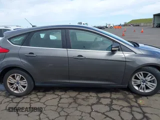 2012 Ford Focus SEL with VIN 1FAHP3M29CL314685, listed as a IAAI auction lot 41974881 with 167,119 mi miles. Bid and sale history available at carsss.com. Image 13.