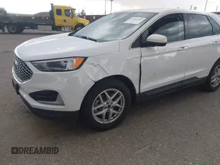 2024 Ford Edge SEL z VIN 2FMPK4J90RBA77889, wystawiony jako IAAI lot #42484303 z przebiegiem 51 211 mil mil oraz . Historia ofert i sprzedaży dostępna na DreamBid. Obrazek 6.