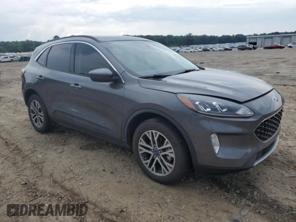 2021 Ford Escape SEL with VIN 1FMCU9H68MUB09069, listed as a Copart auction lot 58760215 with 27,694 mi miles and Salvage title. Bid and sale history available at DreamBid. Image 4.