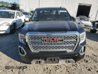 2022 GMC Sierra 1500 Denali with VIN 3GTU9FEDXNG209951, listed as a Copart auction lot 57488985 with 49,039 mi miles and Salvage title. Bid and sale history available at DreamBid. Image 5.