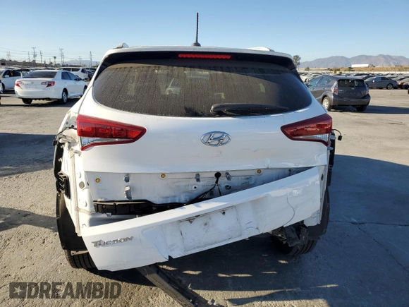 2017 Hyundai Tucson SE with VIN KM8J33A40HU493628, listed as a Copart auction lot 80683164 with 71,374 mi miles and Salvage Title. Bid and sale history available at DreamBid. Image 6.