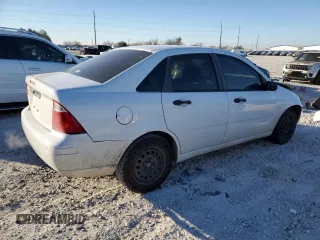 2007 Ford Focus S with VIN 1FAFP34N47W243028, listed as a Copart auction lot 55147695 with 218,672 mi miles and Salvage title. Bid and sale history available at DreamBid. Image 3.