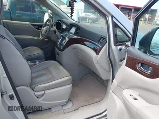 2014 Nissan Quest S with VIN JN8AE2KP7E9100163, listed as a IAAI auction lot 42235765 with 134,016 mi miles and . Bid and sale history available at DreamBid. Image 5.