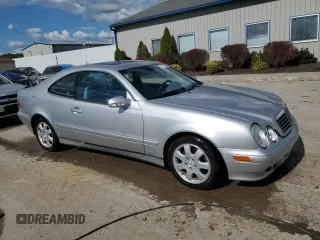 2000 Mercedes-Benz CLK 320/430 with VIN WDBLJ65G9YF132328, listed as a Copart auction lot 71779694 with 113,412 mi miles and Salvage Title. Bid and sale history available at DreamBid. Image 4.